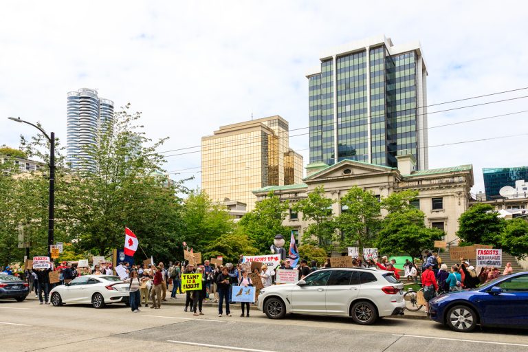 A group of Democracy Rising protestors in downtown Vancouver bC